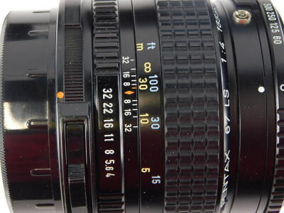 A Pentax 67 camera, with 55mm f4 SMC lens and hood, and a 165mm f4 SMC lens, with a set of auto extension tubes. - 3