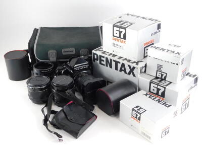 A Pentax 67 camera, with 55mm f4 SMC lens and hood, and a 165mm f4 SMC lens, with a set of auto extension tubes. - 7