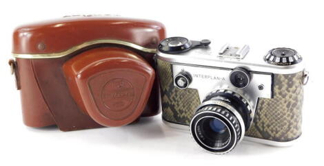 A Corfield Periflex Interplan A camera, with a faux snakeskin body, and a 50mm f2.8 Lumar lens, in a leather case.