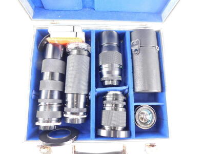 Various camera lenses to fit a Rolleiflex SL2000F and a Rolleiflex 3003 camera, to include a Rolleinar MC 2000mm f4.5 Telephoto lens, a HFT Rolleinar 28-80mm f3.5-4.5 macro zoom lens, a HFT Rollei Tele-tessar 135mm f4 lens, a Sunagor 28mm f2.8 wide angle - 2