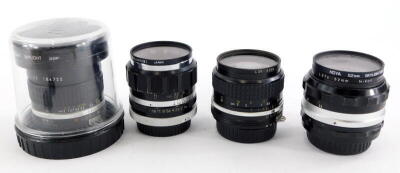 Four camera lenses to fit Nikon cameras, to include a Nikkor 18mm f3.5 super wide angle lens, a Nikkor 28mm f3.5 wide angle lens, a Nikkor 50mm f1.4 lens, and an Auto Rikenon 55mm 1.4 lens. (Nikon fit)