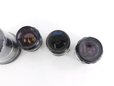 Four camera lenses to fit Nikon cameras, to include a Nikkor 18mm f3.5 super wide angle lens, a Nikkor 28mm f3.5 wide angle lens, a Nikkor 50mm f1.4 lens, and an Auto Rikenon 55mm 1.4 lens. (Nikon fit) - 2