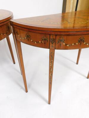 A pair of 19thC Sheraton revival hand painted satinwood demi lune card tables, with baize lined folding tops, oval painted vignettes within painted swags with urns, raised on square taper legs, 77cm high, 46cm deep. - 5