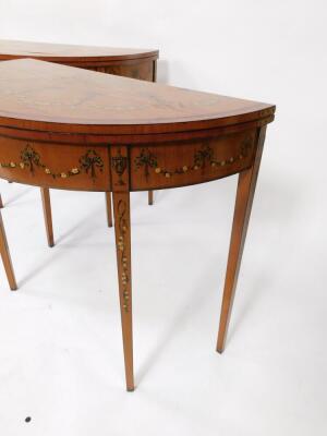 A pair of 19thC Sheraton revival hand painted satinwood demi lune card tables, with baize lined folding tops, oval painted vignettes within painted swags with urns, raised on square taper legs, 77cm high, 46cm deep. - 6