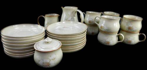 A Denby pottery part tea service decorated in the Daybreak pattern, comprising milk and cream jugs, sucrier, eight cups, saucers and tea plates.