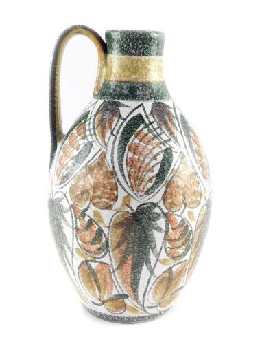 A Denby pottery 1960's flagon designed by Glyn College, decorated with stylised leaves, printed mark, 31.5cm high.