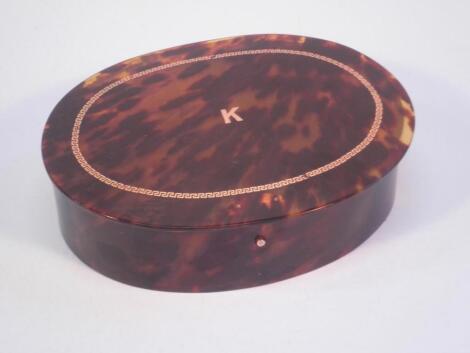 A 19th/early 20thC tortoise-shell and piquet ovoid box and cover