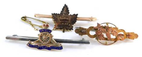 A 9ct gold maple leaf bar brooch, engraved for Canada, a Victorian 9ct gold brooch cast with a bird and flowers, 4.2g., and a silver and enamel Royal Artillery bar brooch. (3)