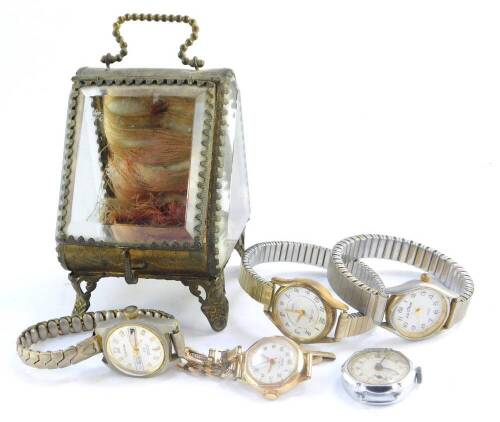 An Oris lady's gold plated wristwatch, Ingersoll Legend wristwatch, three further dress wristwatches, and a Victorian glass panelled pocket watch holder, metal framed. (6)