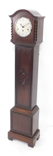 A Kenzle early 20thC oak cased grandmother clock, circular silver dial bearing Arabic numerals, eight day movement with Westminster chimes, the case hood with spiral twist columns, trunk door with panelled motif, raised on bracket feet, with key, 147cm hi