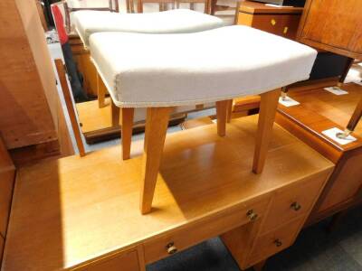 A mid century Georgian style light oak chest, of two short over five long drawers, raised on tapering square legs, 128cm high, 84cm wide, 45cm deep, together with a dressing table, the domed swing framed mirror over one long flanked by four deep drawers, - 7