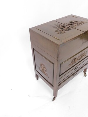 A Chinese mid century stained hardwood hostess trolley, carved in bas-relief with pagodas and figures, the double boxed top with hinged lids, over a central recess above two frieze drawers, raised on square legs on castors, 70cm high, 56.5cm wide, 36cm de - 3