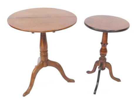 A Georgian oak tripod table, with circular top, 56cm diameter., together with a walnut wine table, with circular top, 58cm high, 36cm diameter. (2)