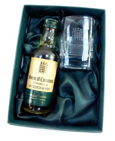 A 5cl bottle of House of Commons 12 years old number 1 Scotch Whisky, together with a whisky glass, boxed.