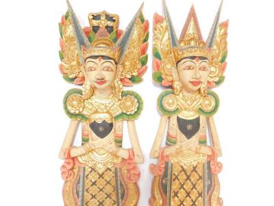 A pair of Balinese wooden carvings of male and female deities, modelled in standing pose, 97cm high. - 3