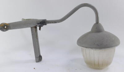 A Coughtrie of Glasgow industrial corner light, 34cm high, 58cm wide.