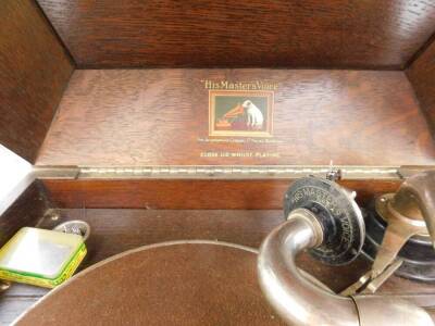 An HMV oak cased table top gramophone, 33cm high, 44.5cm wide, 38cm deep. - 3