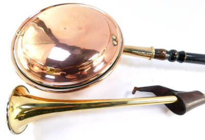 A Victorian copper warming pan, with ebonised handle and a period brass and silver plated post horn, stamped 7155 A.HAYES MANUFACTURER LONDON. (2)