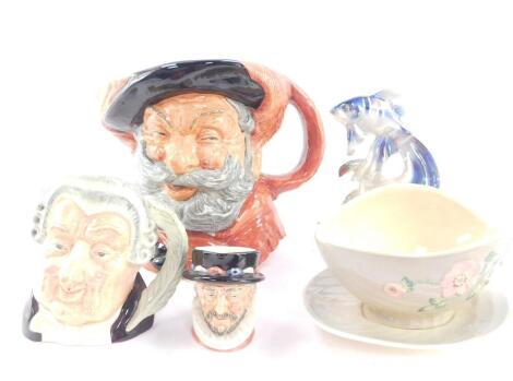 Three Royal Doulton pottery character jugs, comprising Falstaff D6287, The Lawyer D6504, and Beefeater, together with a Jema lustre figure group modelled as a fish and snail, number 264, impressed marks, and a Shorter and Son pottery sauce boat on stand m