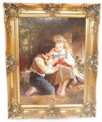 After Emile Munier (French 1840-1895). Boy with girl knitting, oleograph, 59.5cm high, 44cm wide.