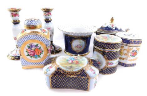 A group of Staffordshire porcelain by Roselle Occ and company, decorated in traditional style with reserves of fete gallante, flowers and birds, comprising a tea caddy, pair of candlesticks, jardinière, octagonal box and cover, oval box and cover, cylindr