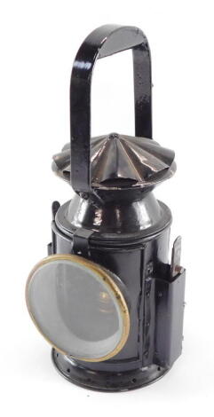 A WWII C. Eastgate & Son Ltd military issue railway lamp, black painted with oval plaque C. Eastgate & Son Birmingham 1945 and crows feet marking, and a copper rectangular location plate London & North Eastern RLY Yarmouth South Town No.8, 33cm high.