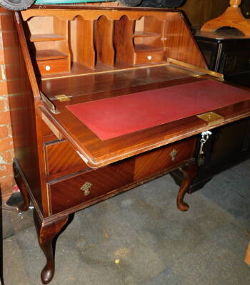 A 20thC mahogany bureau, with fitted interior above three drawers, 102cm high, 79cm wide, 45cm deep.