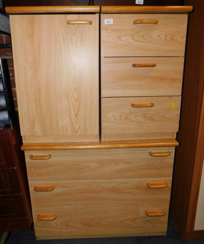 An elm effect chest of three drawers, 66cm high, 81cm wide, 54cm deep., together with two bedside cabinets, 65cm high, 41cm wide, 54cm deep. (3)