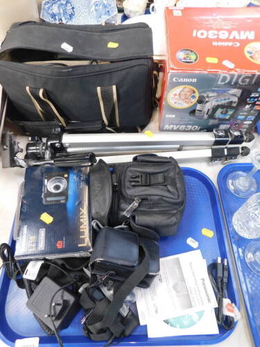 Cameras and related equipment, to include a boxed Cannon MV630i camcorder, 12cm high, folding tripod, Lumix Panasonic L210 camera, other cases, associated equipment, camcorders, etc. (a quantity)