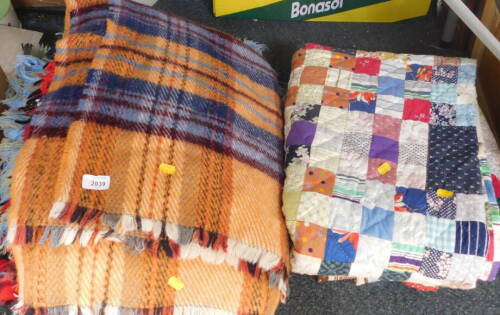 Various rugs, tartan throws, patchwork quilt, etc. (a quantity)