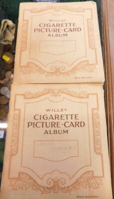 Two Wills's cigarette picture card albums, for Garden Flowers and Speed.