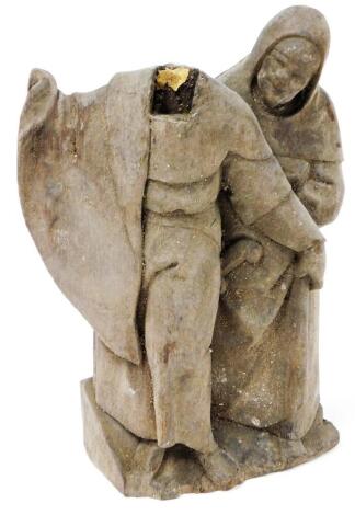 An antique oak carving of two monks, 31cm high. (AF)