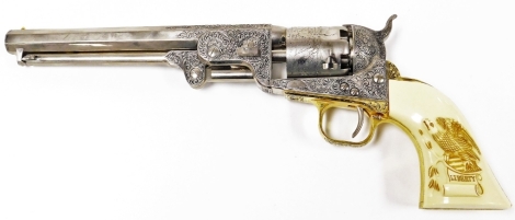 A fine replica of the Colt .36 calibre 1851 Navy Revolver, numbered 138813E, with engraved barrel marked 'Engaged 16 May 1843', with handle bearing eagle on Liberty scroll, 34cm long.