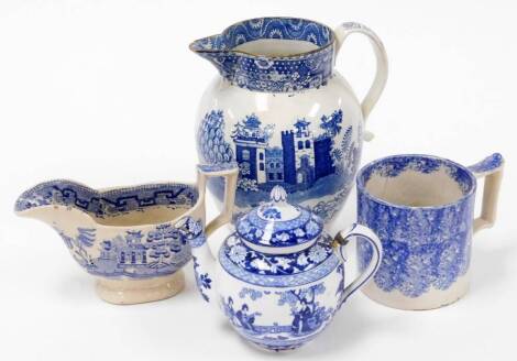 A group of late 19thC/early 20thC blue and white wares, to include a blue and white jug, with Eastern figures farming, with castle, 20cm high, (AF), a blue and white mottled tankard, a Booths silicon china teapot and a blue and white gravy boat. (4)