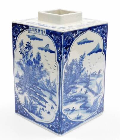 A Chinese porcelain blue and white porcelain tea canister, decorated with shaped panels of figures, buildings, trees and mountains, with floral spandrels, six character Kangxi mark to one side, probably 20thC, 28cm high.