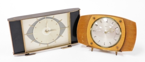 Two Metamec Art Deco mantel clocks, one in black wooden design with chrome finish face, the other in oak, with a circular dial with seven jewel movement, 15.5cm and 17.5cm high respectively.