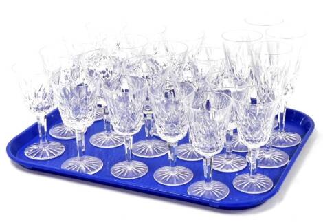 A group of Waterford crystal and other drinking glasses, to include four champagne flutes, a set of six wine glasses and six sherry glasses. (a quantity)