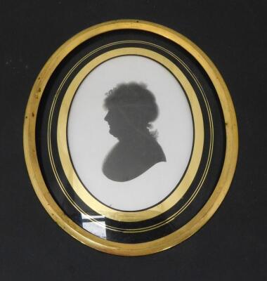 A pair of 19thC silhouettes, and another similar, each of oval form, facing sinister and dexter, comprising a gentleman and two ladies, in verre eglomise lined oval mounts and rectangular ebonised frames, with profile painter and jewellers labels hand wri - 6