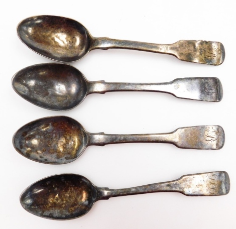 A set of three George IV silver teaspoons, Fiddle pattern, initialled, and another George III silver teaspoon, makers marks indistinct, 13cm wide, 2.7oz, (4, AF)