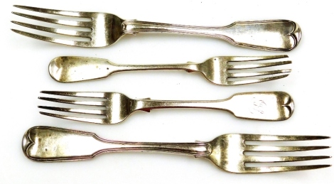 A pair of George IV Fiddle pattern table forks, with engraved mitre crest London 1821, two dessert forks Exeter 1839 and London 1854, 10oz.