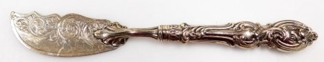 A Victorian silver butter knife, with ornate handle, Birmingham 1858, 20cm wide, 1oz all in.