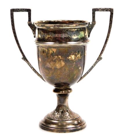 A George V silver two handled prize cup, 15cm high, Sheffield 1910, inscribed 'The Bell Efficiency Cup' relating to 'The British Red Cross', 6oz.