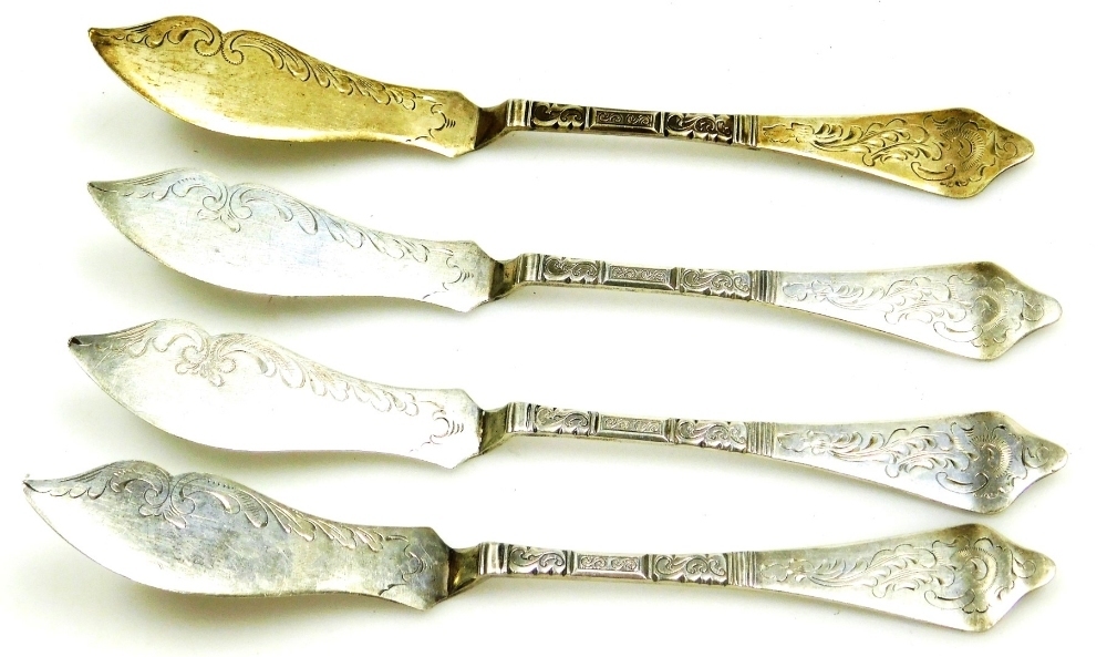 A set of four Danish fish or butter knives, white metal, each with a  tapering engraved