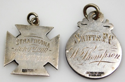 Two silver football medallions, awarded to W Thompson, Strathcona July 1st 1910, and United Aids Championship Shield 1911, Swift's FC, 20.4g. (AF) - 2