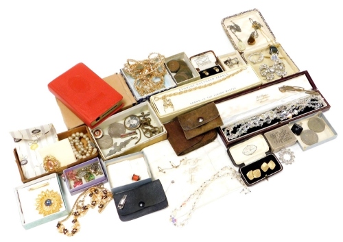 A group of costume jewellery and effects, to include faux pearl necklaces, gold plated necklaces, various tins, chains, brooches, money box, etc. (a quantity)