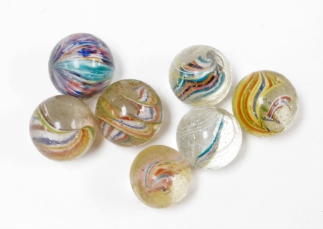 Seven late 19th/early 20thC glass marbles, each with a coloured swirl decoration, 2.5cm diameter etc. (7)