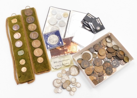 A group of decimal and pre decimal coinage, to include a group of silver three pence pieces, a silver one florin and an Edward VII two shilling, together with various collectors crowns, pennies, half pennies, mounted pennies, etc. (a quantity)