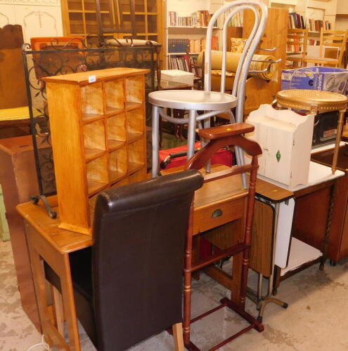 A group of miscellaneous furniture, to include a fire guard, a twelve section wall unit, a painted silver bentwood chair, a faux leather kitchen chair, a suit rack, side table, painted barley twist table, gilt stool, and a white wall unit. (a quantity)