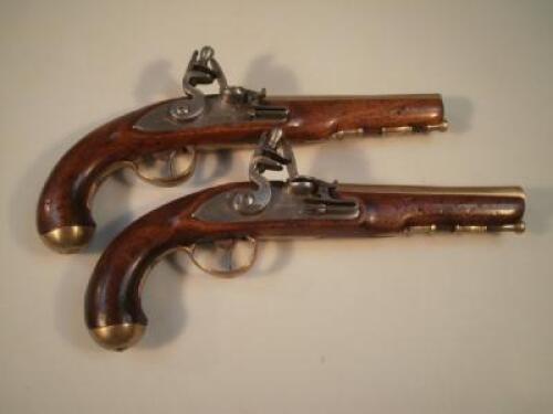 A pair of 18thC style flintlock pistols with steel locks marked 'Ketland'