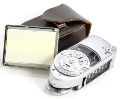 A Leica-meter MC, with incident light attachment, each in leather case. (2)